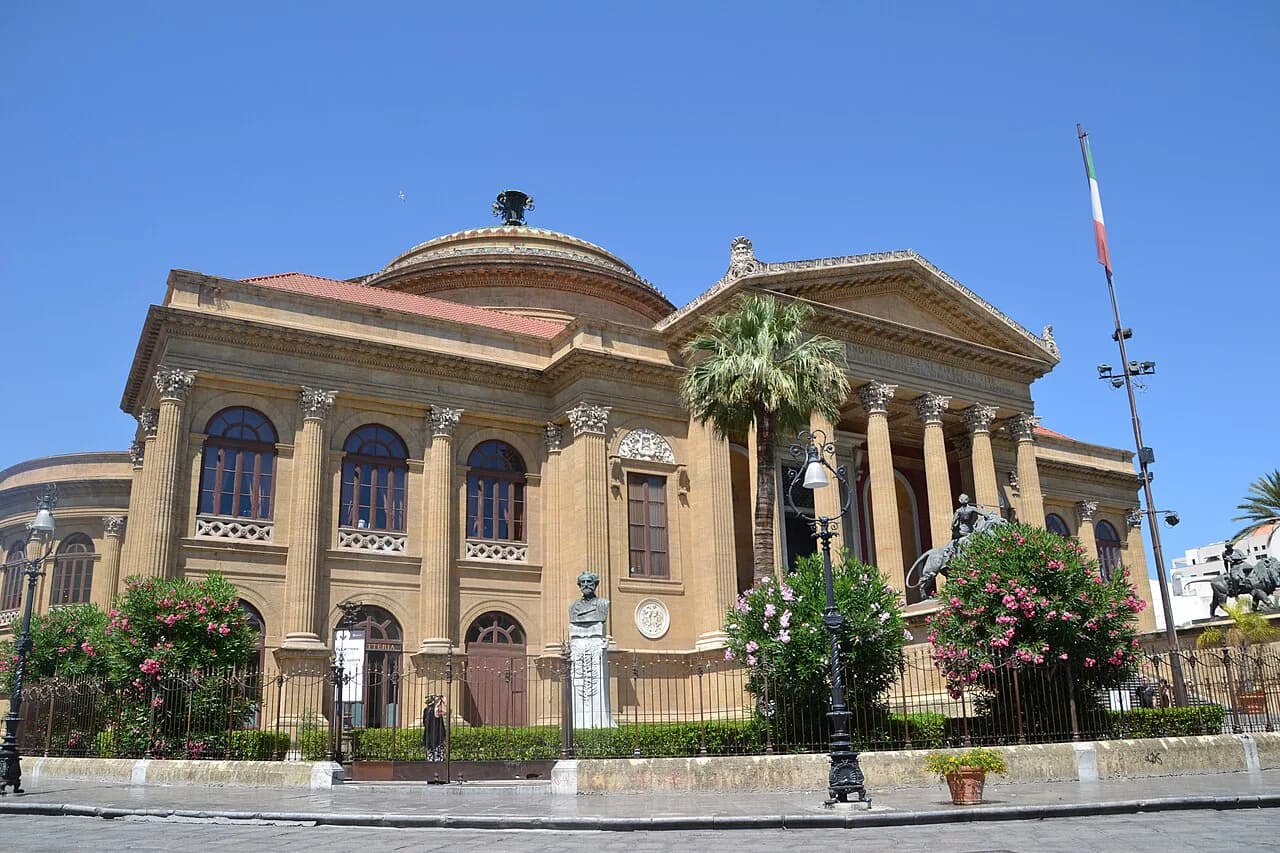 Teatro Massimo opera house in Palermo, with its columned portico, dome and palm trees