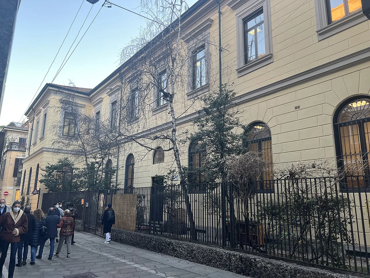 Elegant palazzo with a railed front garden on Via della Spiga in Milan’s fashion district