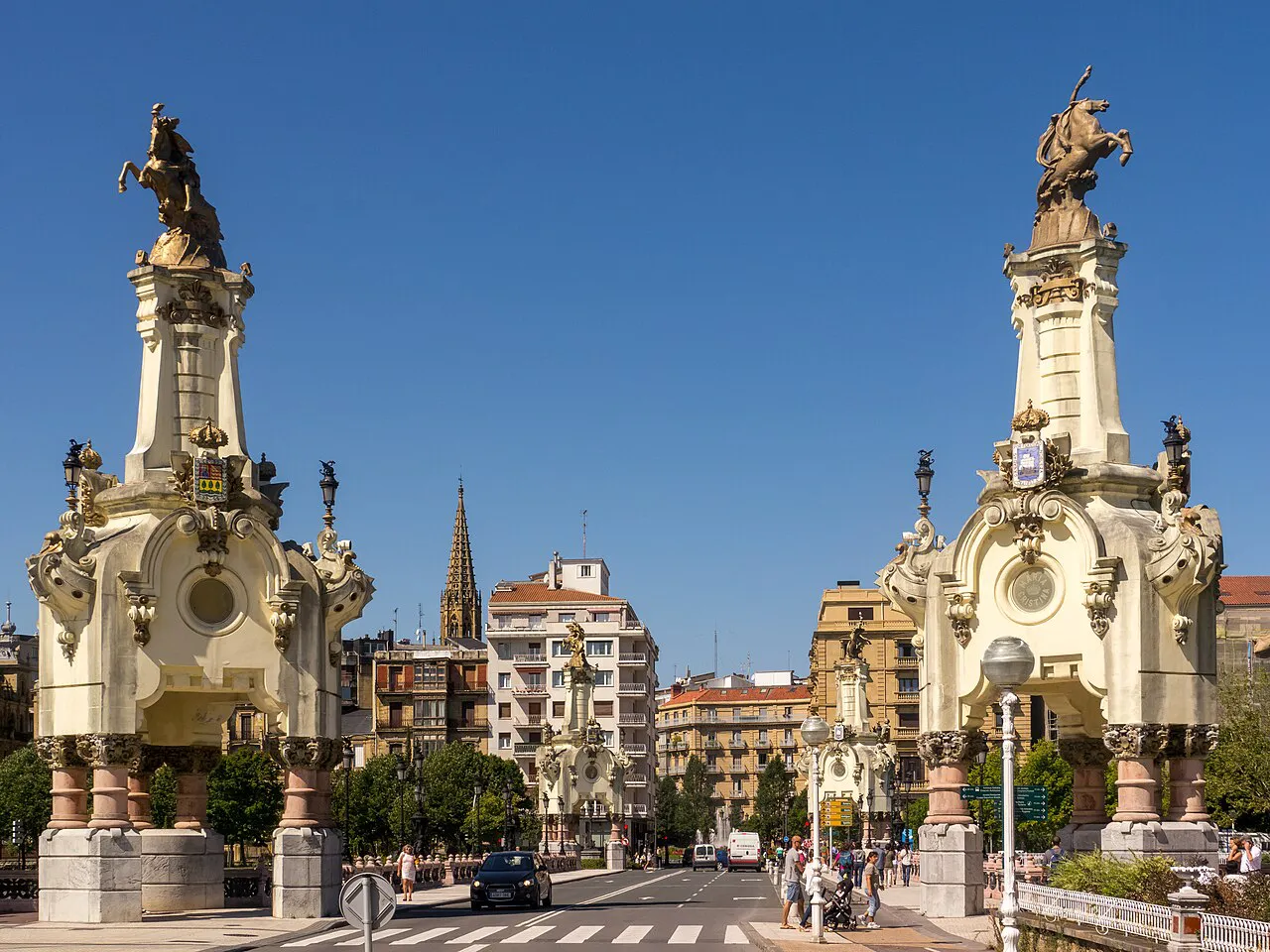Ornate pylons topped with gilded equestrian figures at the María Cristina Bridge over the Urumea, San Sebastián