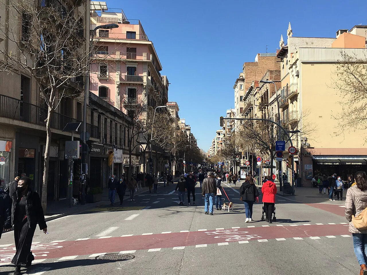 Carrer de Sants, a long shopping street of apartment buildings in the Sants district of Barcelona