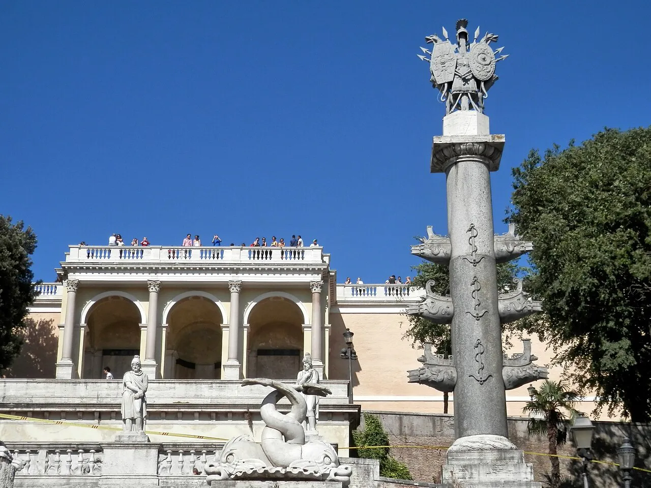 Pincio terrace and its loggia above Piazza del Popolo in Rome under a deep blue sky