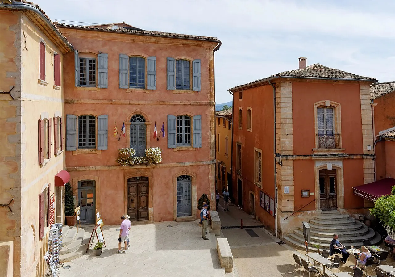 Ochre-coloured houses around the village square of Roussillon in the Luberon