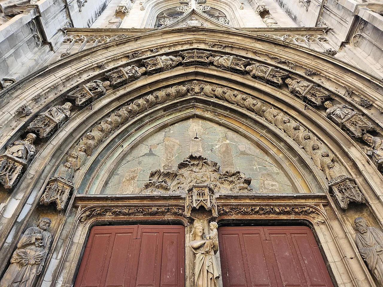 Carved Gothic portal and wooden doors of the Cathédrale Saint-Sauveur in Aix-en-Provence