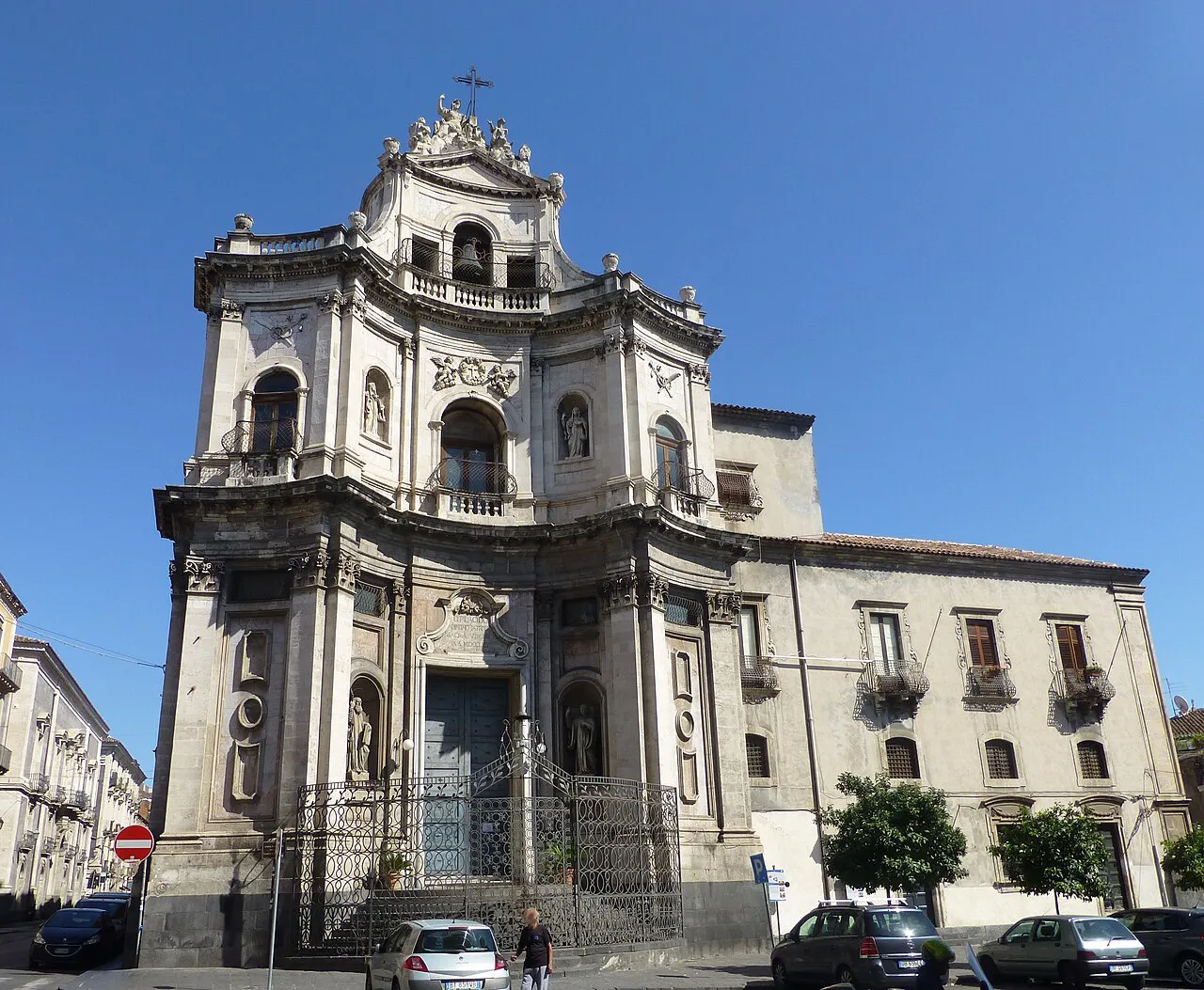 Baroque facade of the Chiesa di San Placido in Catania's old town under a clear blue sky