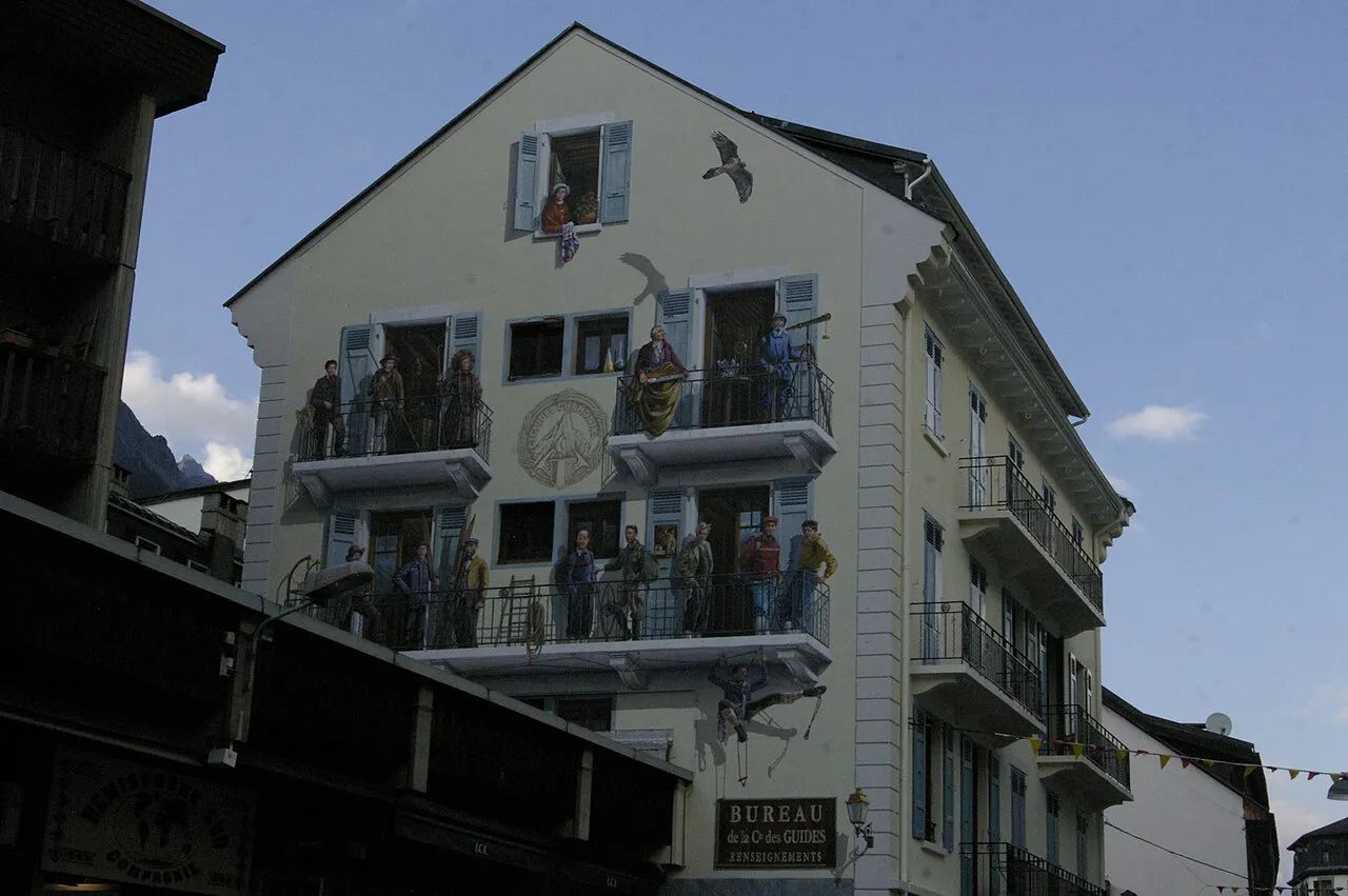Painted trompe-l'oeil mural of climbers on the Maison des Guides facade, Rue du Docteur Paccard, Chamonix