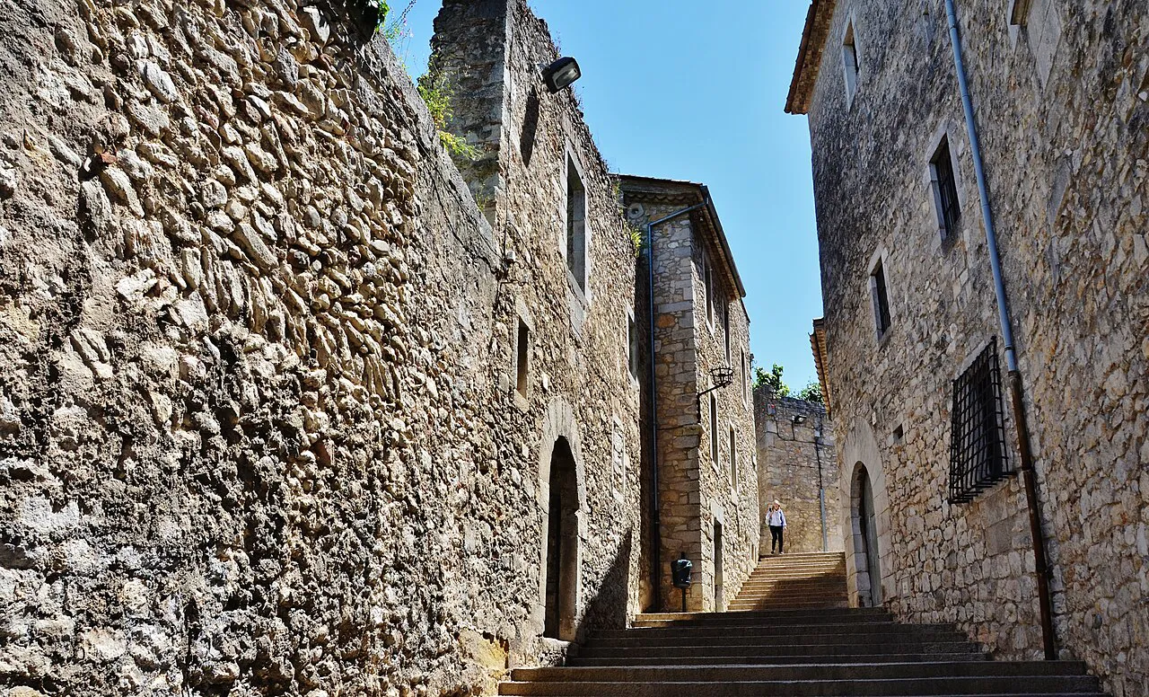 Narrow stone-walled stairway lane in the Barri Vell, Girona’s old town