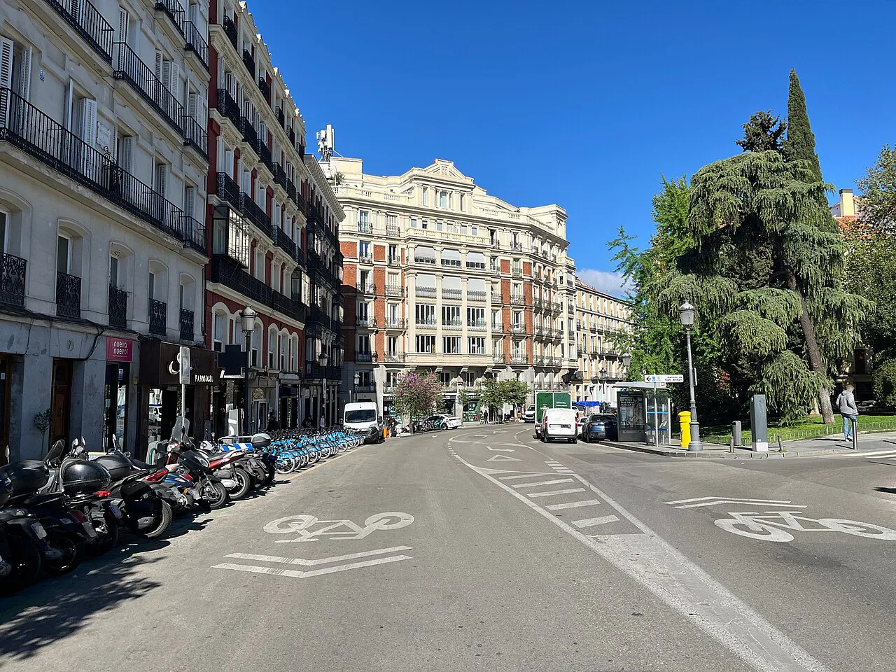 Sunny street of ornate apartment buildings beside Plaza de las Salesas in the Justicia quarter of Madrid