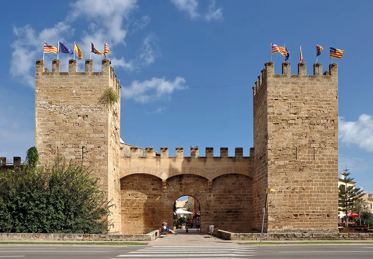 The twin crenellated towers of the Porta Principal gate in Alcúdia’s medieval town walls