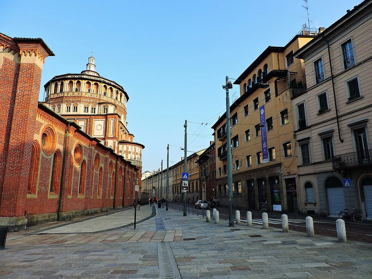 Corso Magenta in Milan with the red-brick church of Santa Maria delle Grazie and its dome on the left