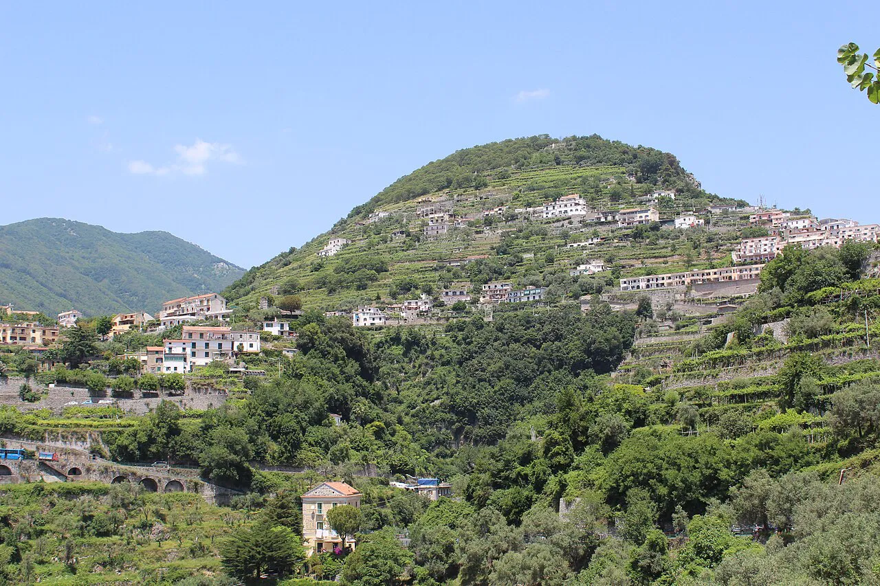 Terraced green hillside dotted with white houses around Ravello on the Amalfi Coast