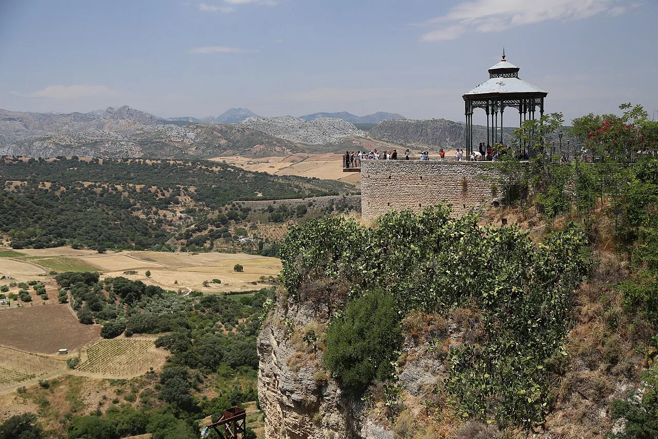 Clifftop viewing pavilion above Ronda's gorge, overlooking farmland and the Serranía de Ronda hills