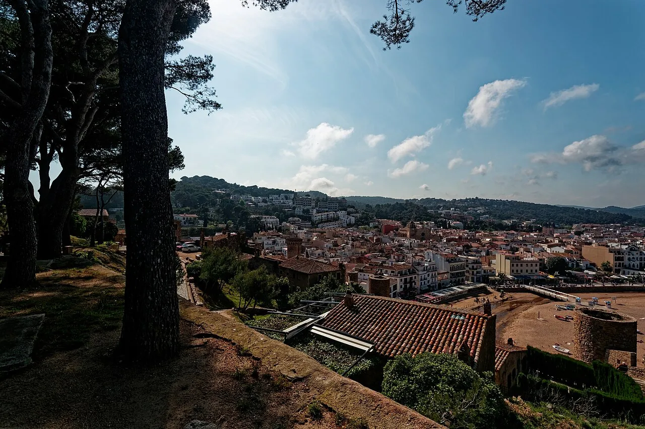 Panoramic view over Tossa de Mar's houses from the pine-shaded Vila Vella hill