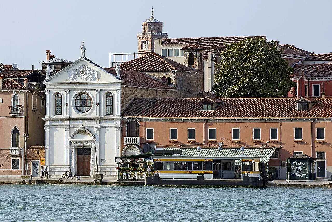 Zattere waterbus stop and the white facade of Santa Maria della Visitazione on the Giudecca Canal, Venice