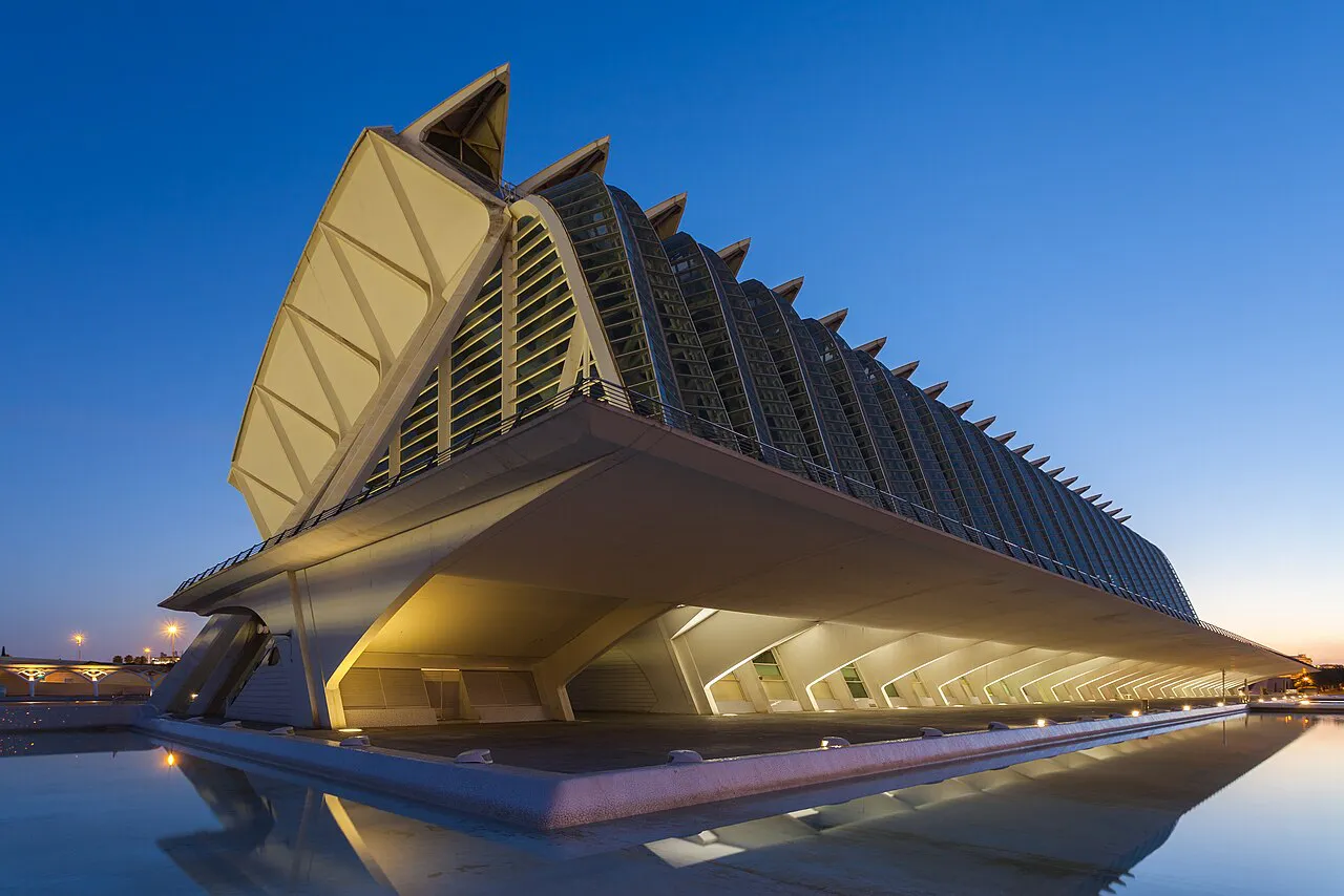 Príncipe Felipe Science Museum at Valencia's City of Arts and Sciences reflected in water at blue hour