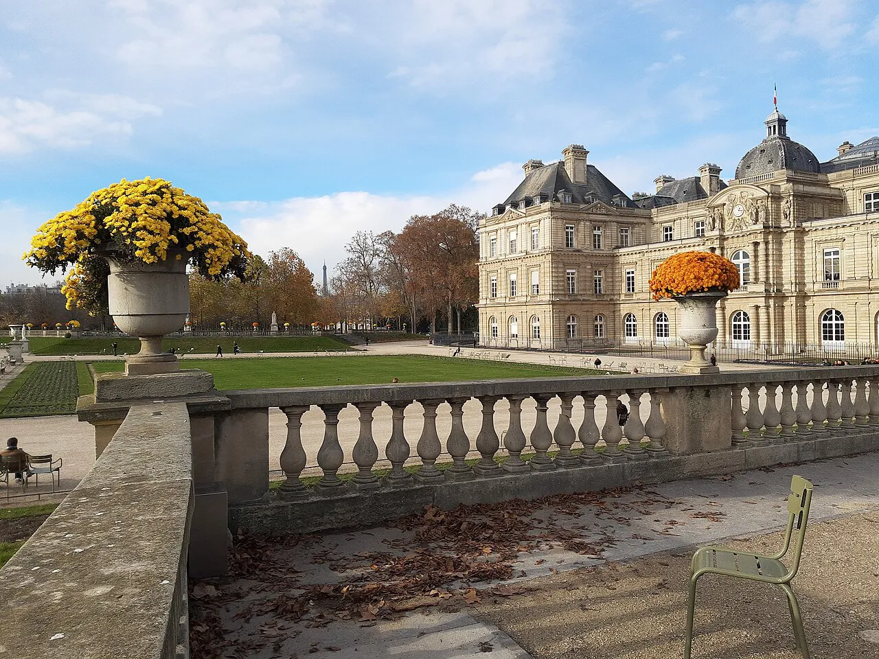 Autumn flower urns on a stone balustrade facing the Luxembourg Palace in the Jardin du Luxembourg, Paris