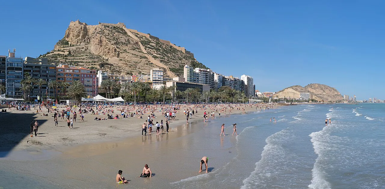 Postiguet Beach in Alicante with Mount Benacantil and the castle rising above the seafront