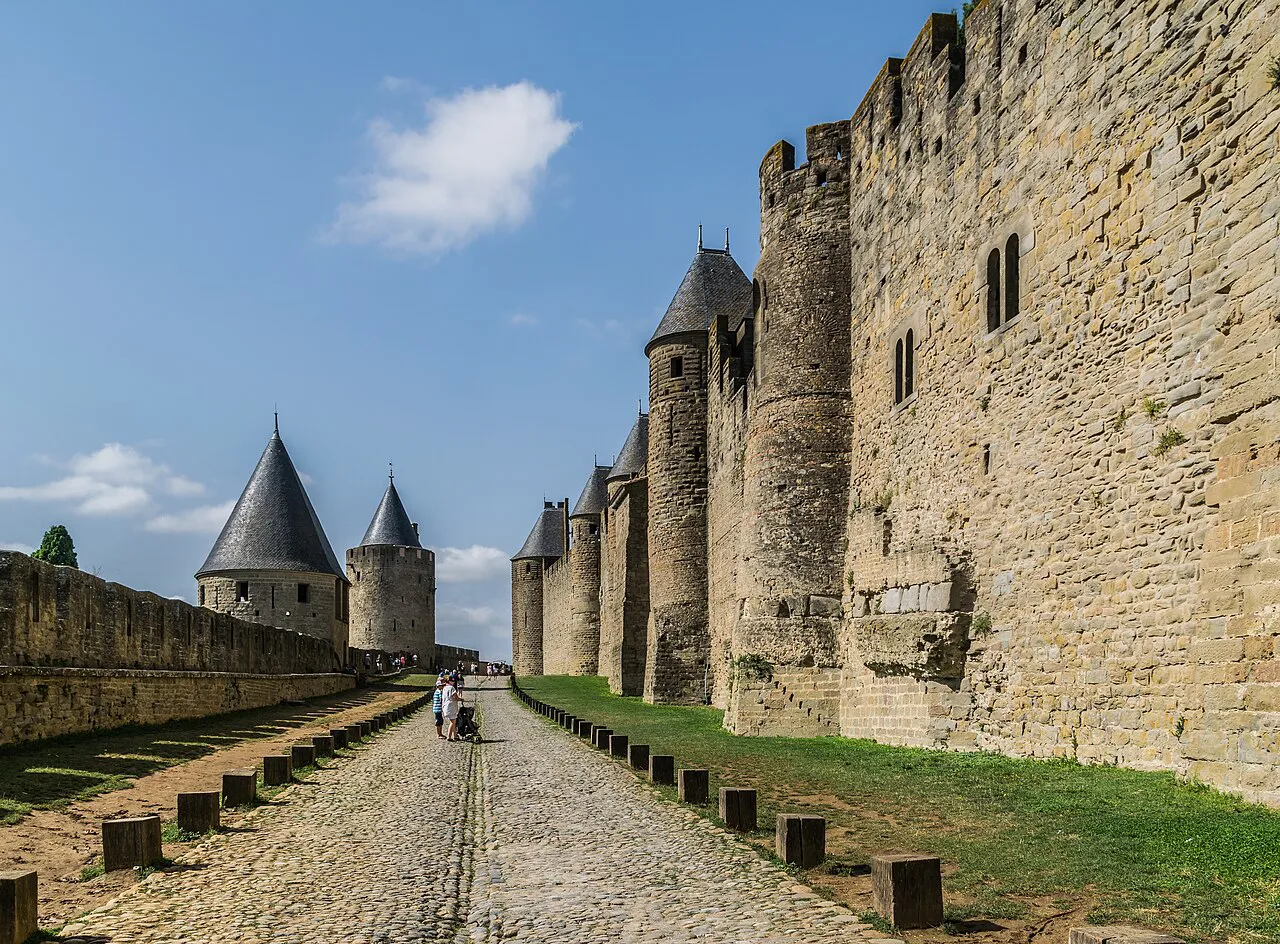 Cobbled Lices path between the double ramparts and towers of the Cité de Carcassonne