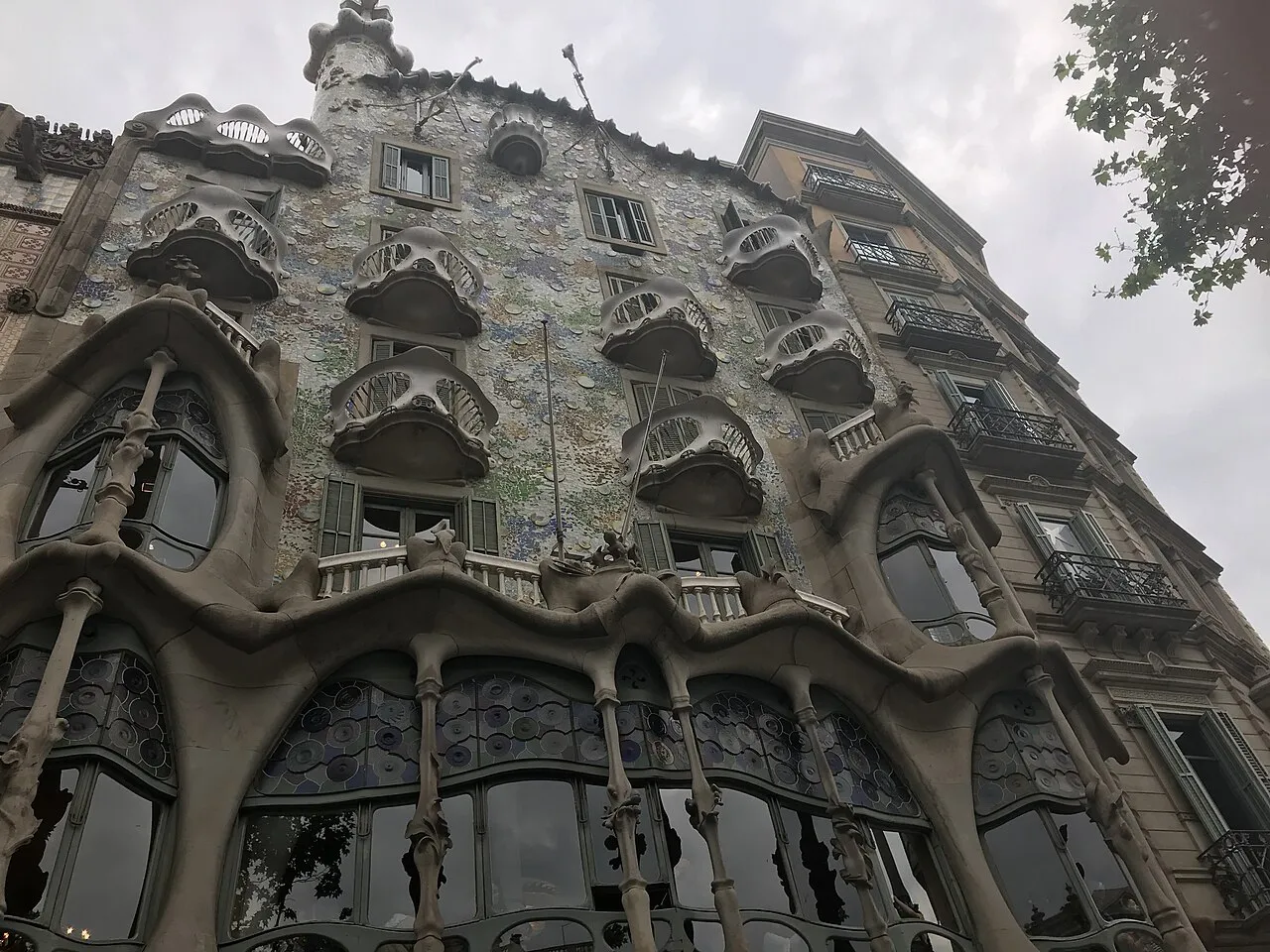 Gaudí's Casa Batlló with its bone-like balconies and mosaic facade on Passeig de Gràcia, Barcelona