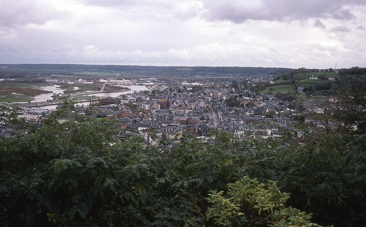 View over the rooftops of Honfleur and the Seine estuary from the wooded heights above the town