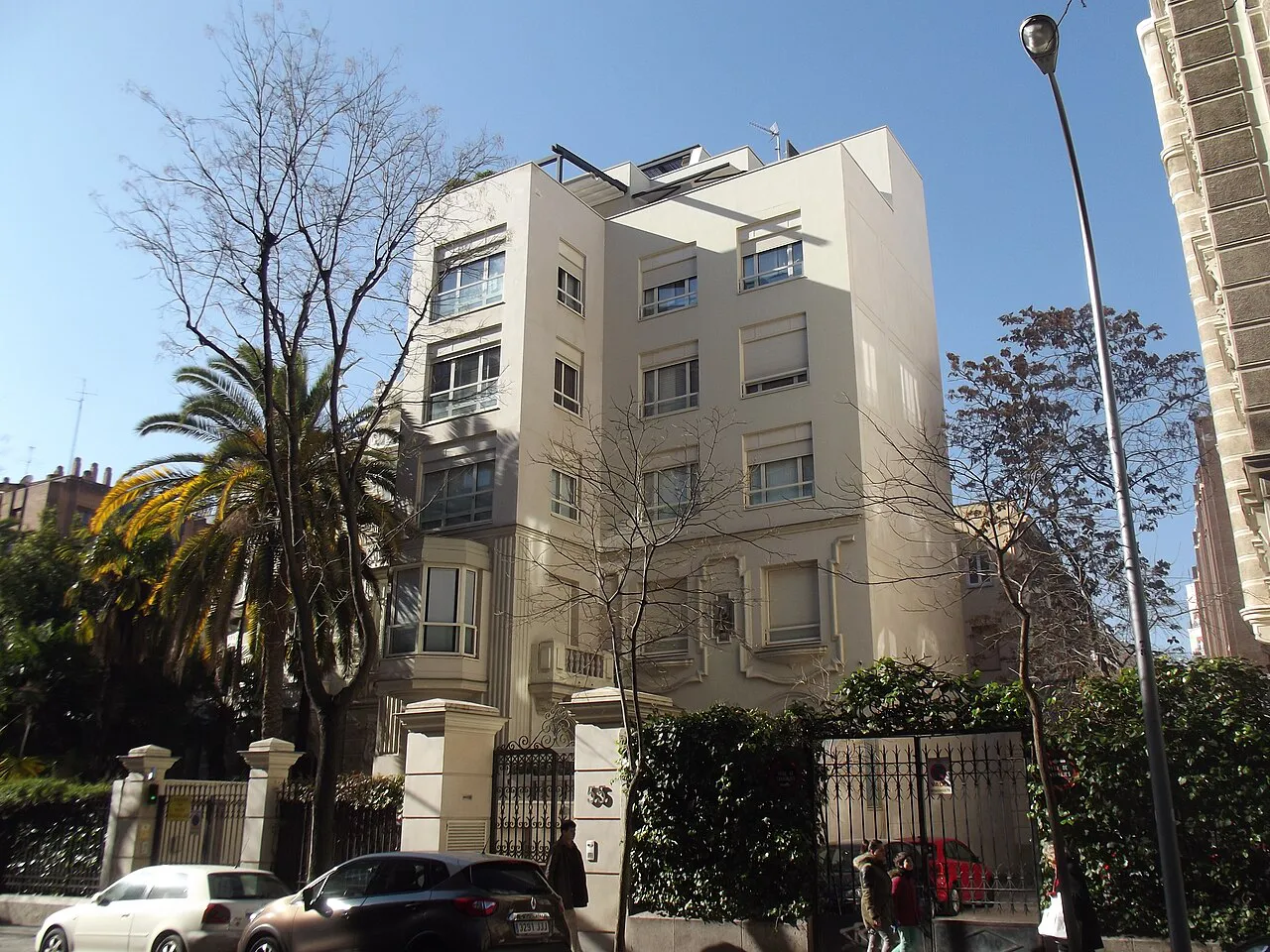 Red-brick palacete with ornate windows on Calle de Zurbano in the Chamberí district of Madrid