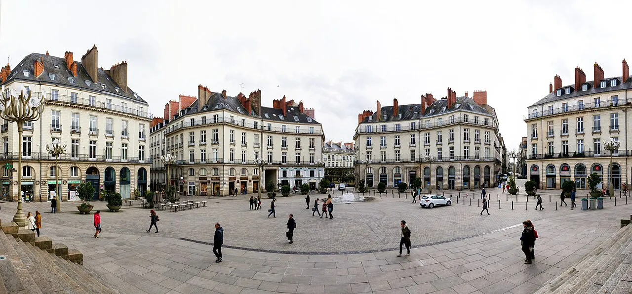 Panoramic view of the paved Place Graslin in Nantes ringed by 18th-century stone buildings