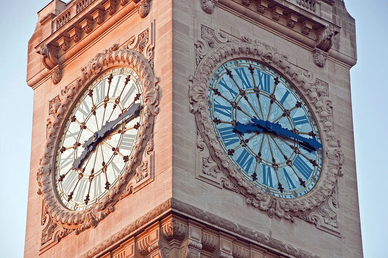 Close-up of the Belle Époque clock faces on the Gare de Lyon tower, Paris