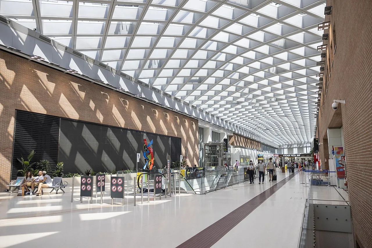 Glass-roofed walkway inside the terminal at Venice Marco Polo Airport in Tessera