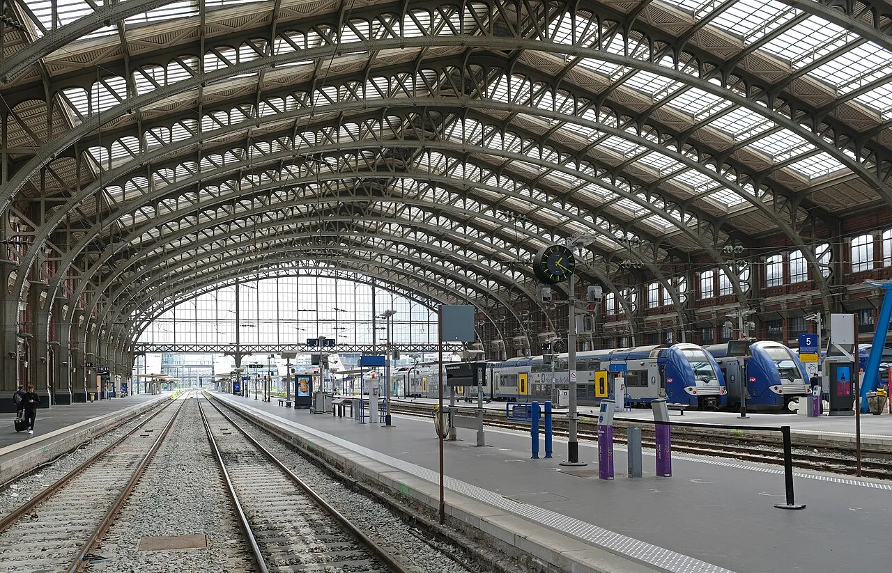 Iron-and-glass train shed over the platforms and tracks of Lille-Flandres station