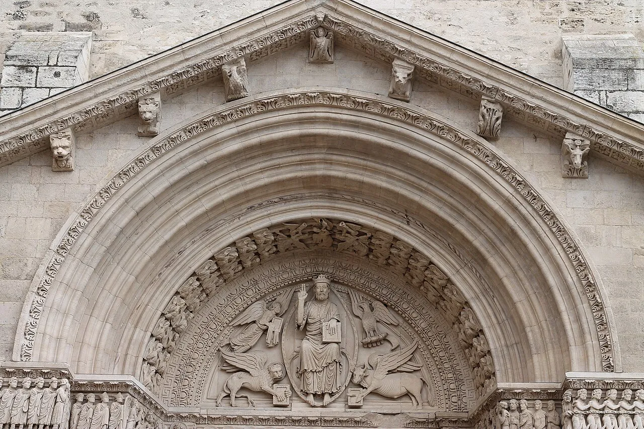 Carved Romanesque tympanum and arch of the Saint-Trophime portal in Arles