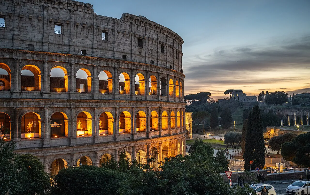 The Colosseum lit at dusk in Rome