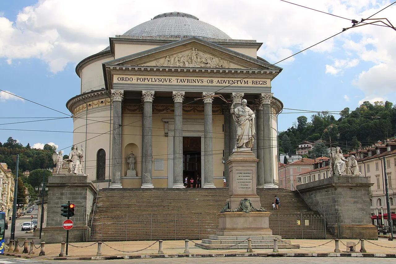 Domed neoclassical Gran Madre di Dio church in Turin, with columned portico and statues on its steps