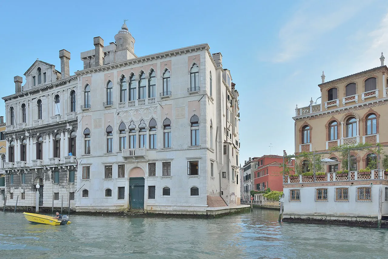 White marble facades of Palazzi Contarini degli Scrigni and Corfù on the Grand Canal in Venice
