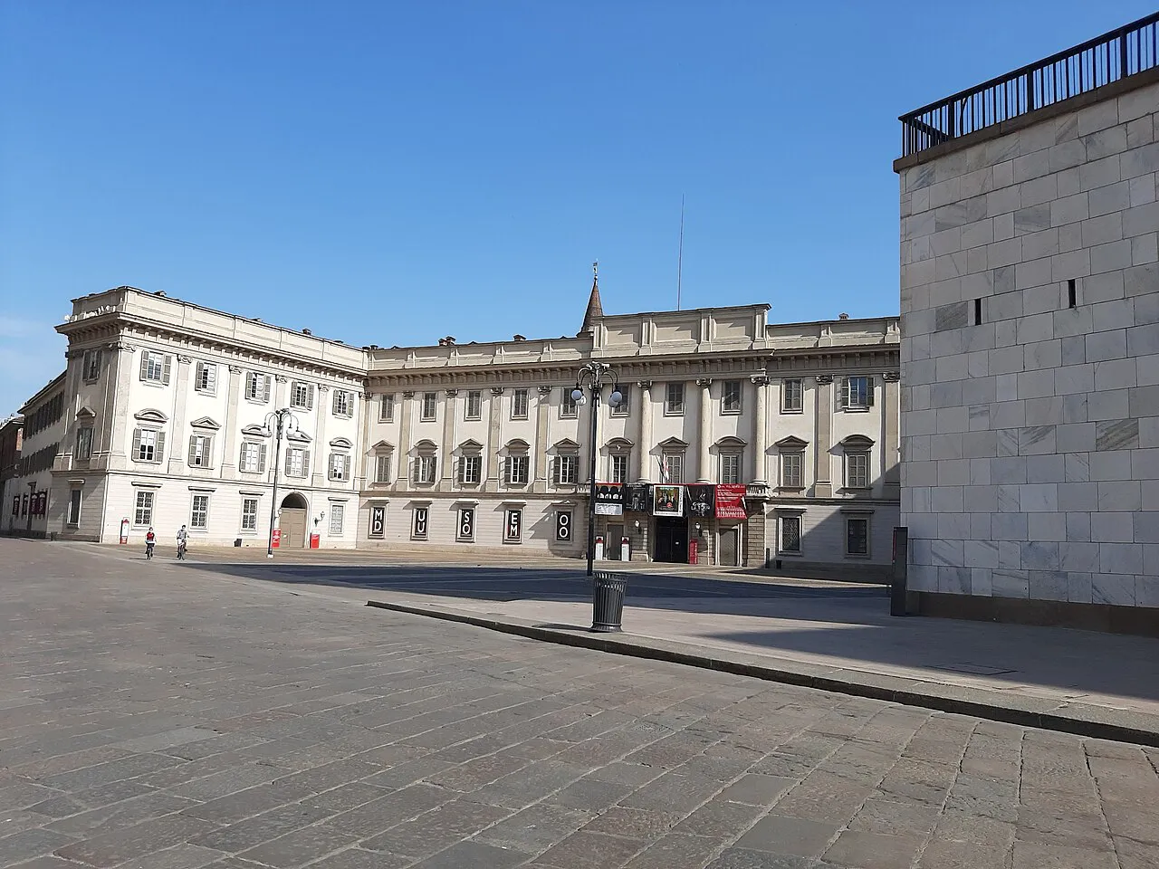 Neoclassical Palazzo Reale facing its open piazzetta beside Milan Cathedral