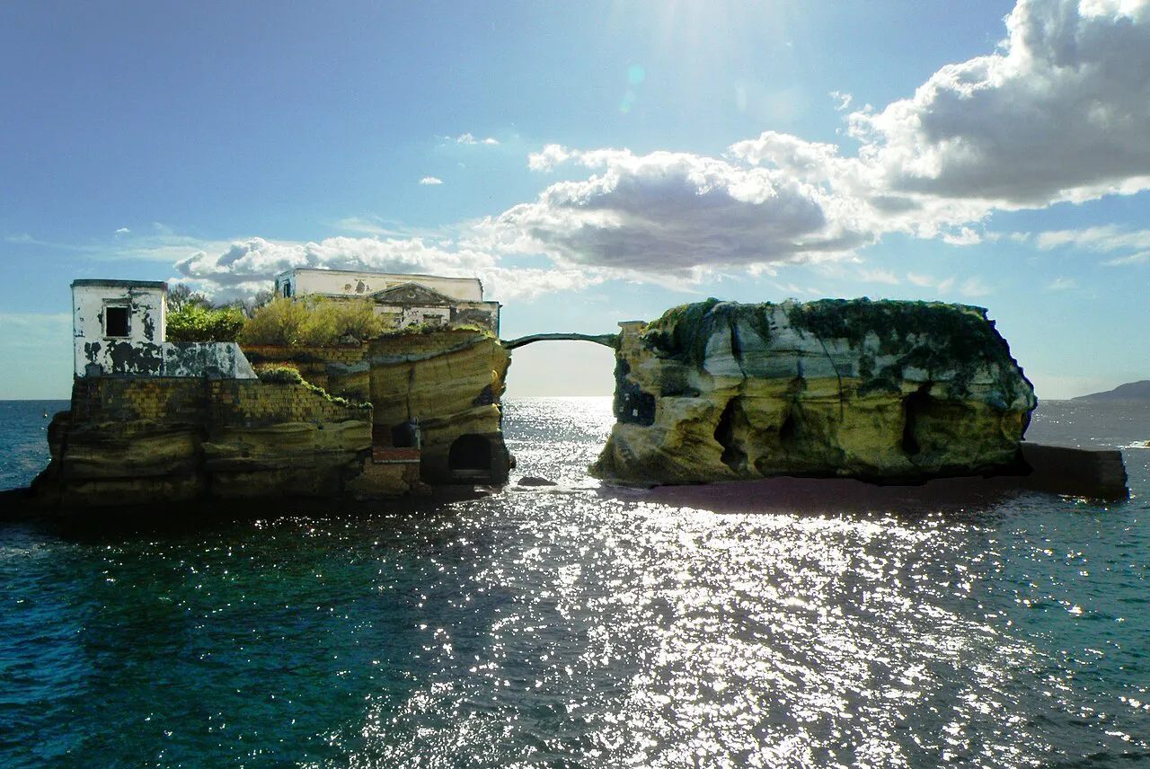 The two rocky islets of La Gaiola joined by a small bridge off the Posillipo coast, Naples