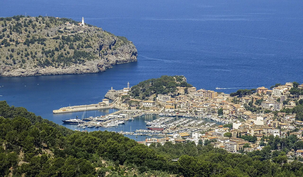 Port de Sóller seen from the hills, a sheltered bay with marina, town and lighthouse headland