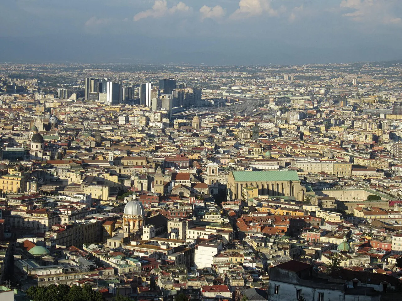 Panoramic view over the dense rooftops and domes of central Naples from the Vomero hill
