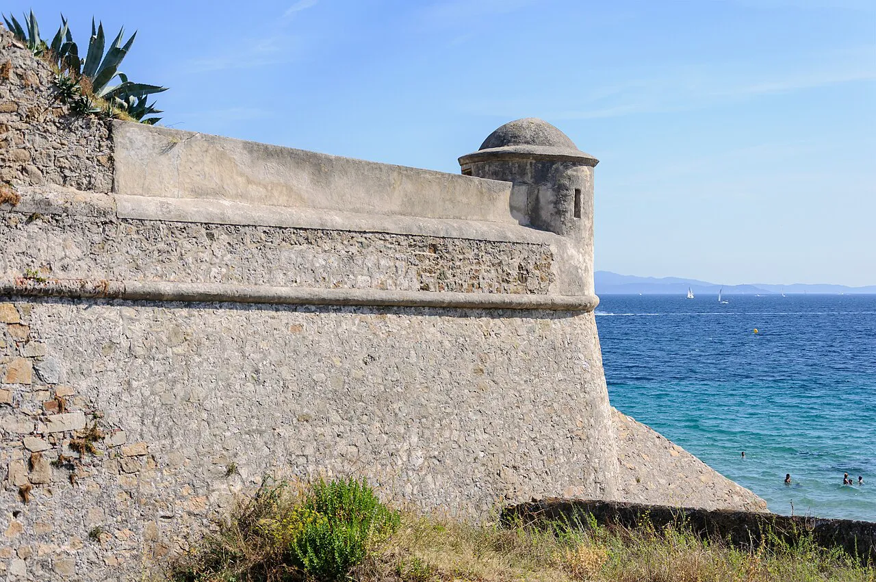Stone bastion and lookout turret of the Ajaccio citadel above the blue sea