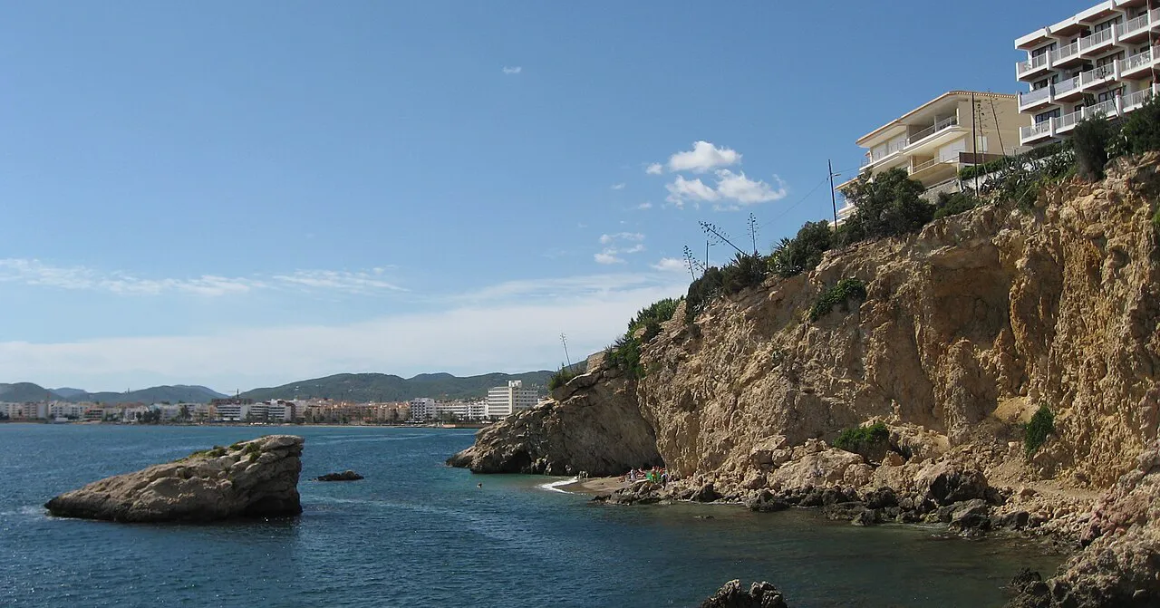 Rocky cove at Los Molinos with a view along the coast towards Figueretes in Ibiza Town