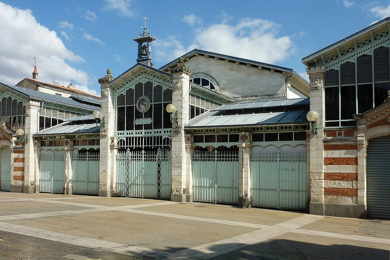 Brick-and-stone facade of the covered Marché Central market halls in La Rochelle