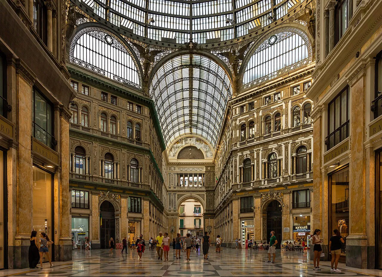 Glass-vaulted interior of the Galleria Umberto I shopping arcade in central Naples