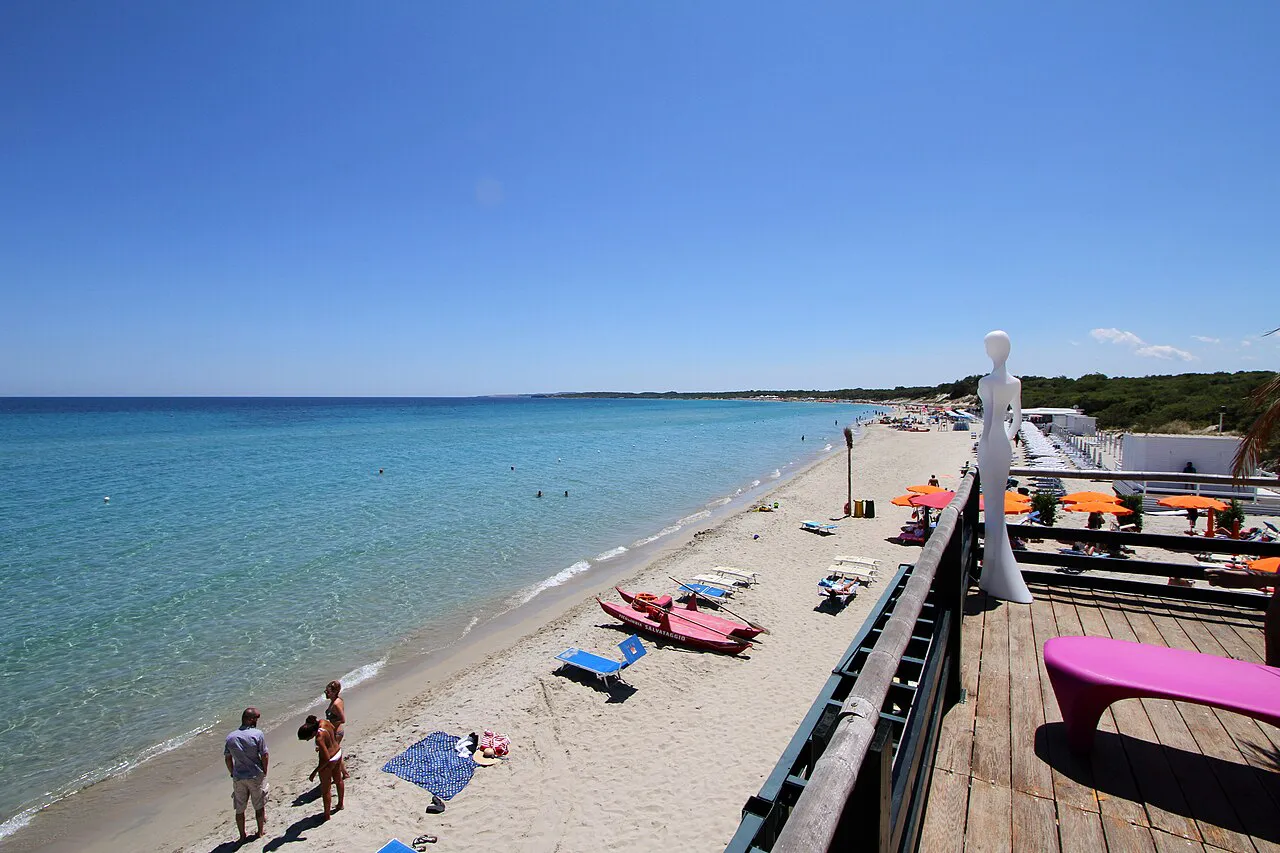 A long sandy beach and clear shallow water on the Alimini coast north of Otranto