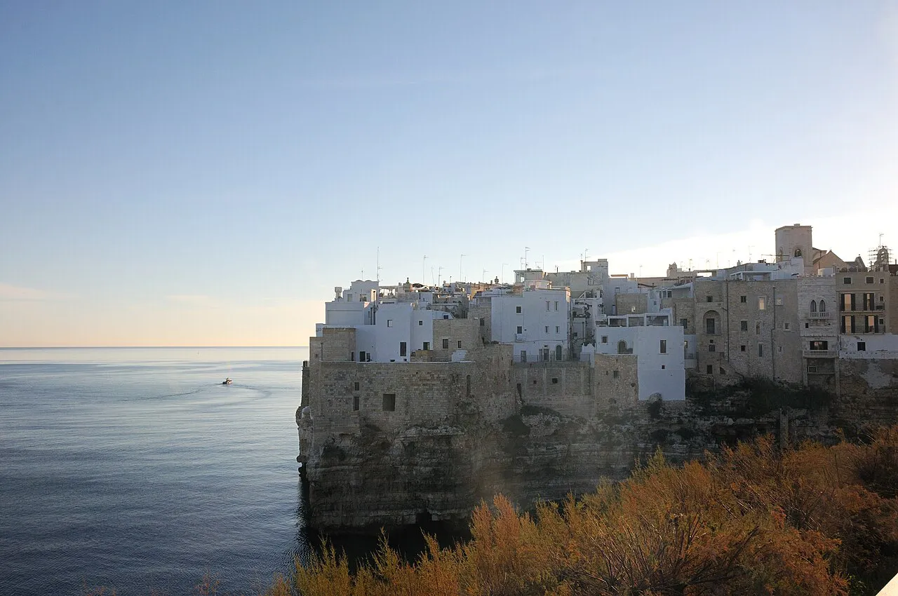 The historic centre of Polignano a Mare perched on limestone cliffs above the Adriatic