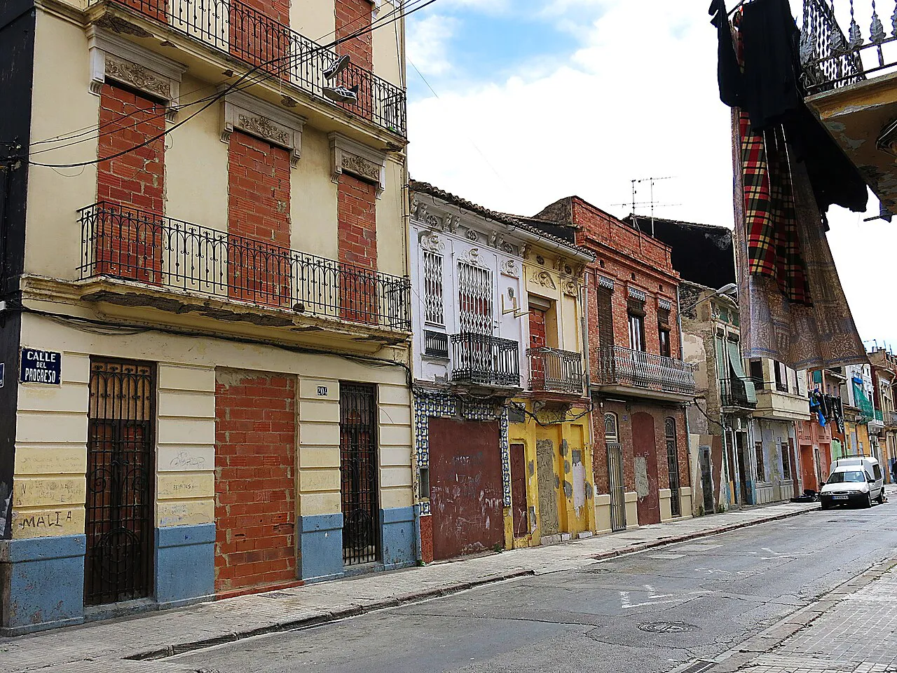 Street of traditional two- and three-storey houses with balconies in Valencia's El Cabanyal district